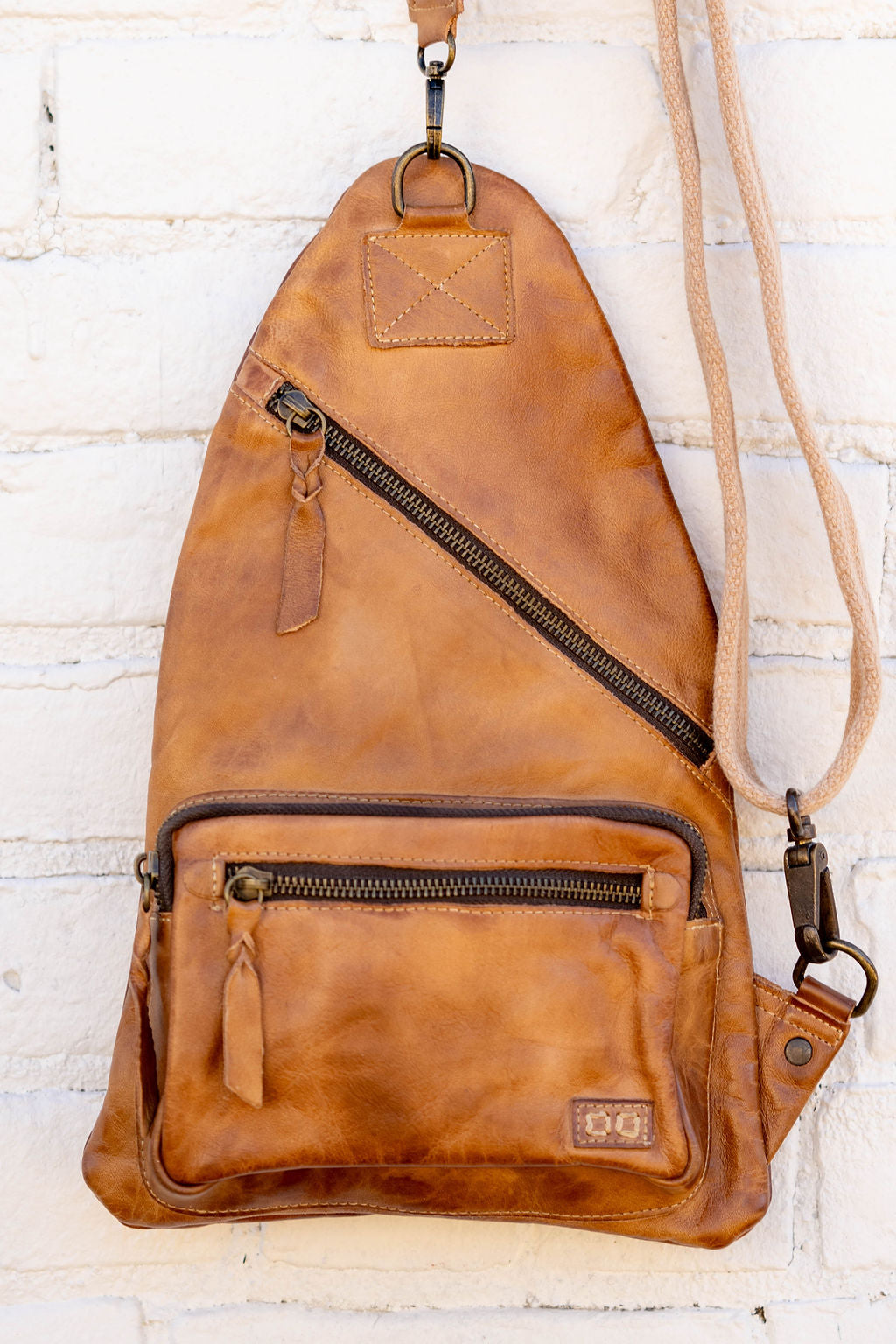 bed stu patsy tanned perforated leather backpack Andie BedStu Tan Rustic color_red W0633 AF ABU GARCIA The Dominique backpack is Color:#C248F