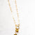 Golden Glow Charm Necklace