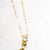 Golden Glow Charm Necklace