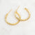 Golden Whisper Hoop Earrings