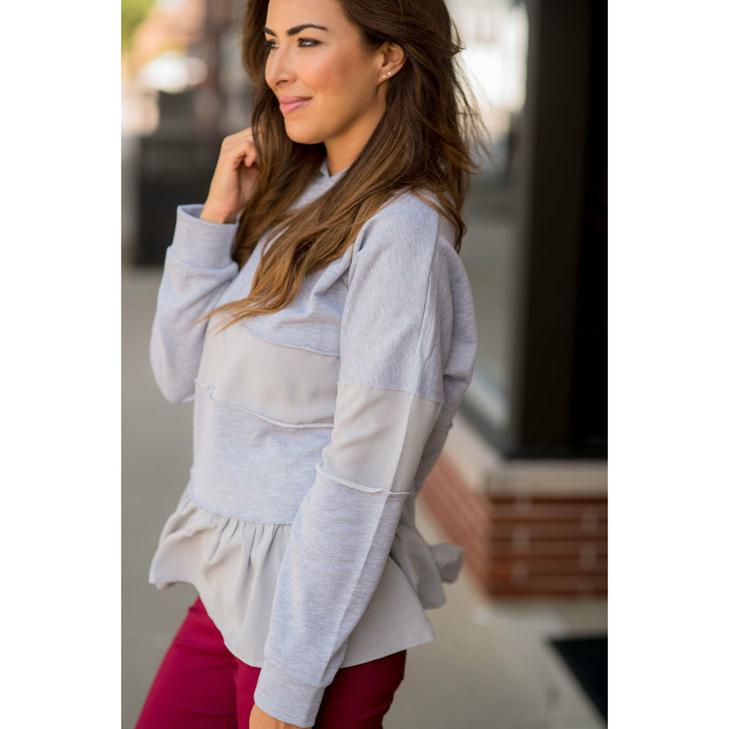 Ruffle Bottom Blouse Accent Hoodie - Betsey's Boutique Shop