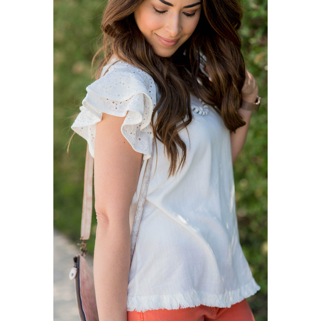 Eyelet Sleeve Fringe Bottom Blouse - Betsey's Boutique Shop