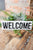 Cast Iron Welcome Sign - Betsey's Boutique Shop - Posters, Prints, & Visual Artwork